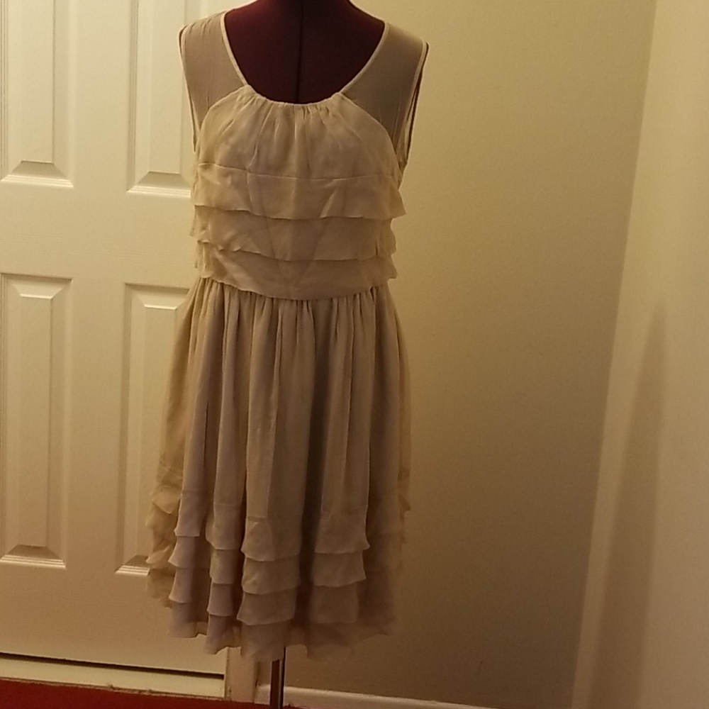 Cream colored sleeveless dress by anthropologie